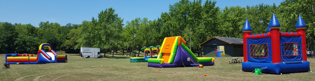 multiple bouncers, dunk tanks and slip N slide